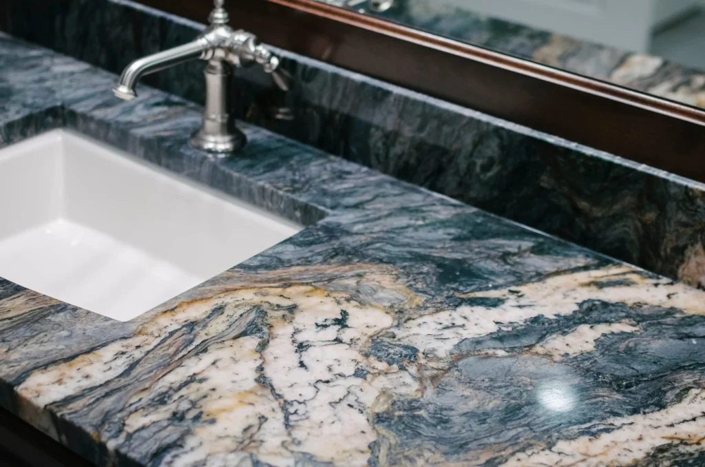 Custom marble bathroom vanity countertop with an undermount sink in an East Tennessee home