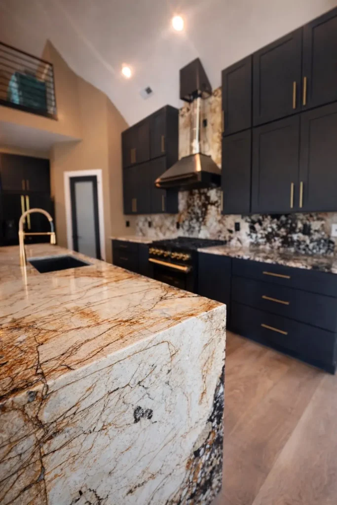 Patagonia quartzite waterfall kitchen island and countertops installed in a custom East Tennessee home