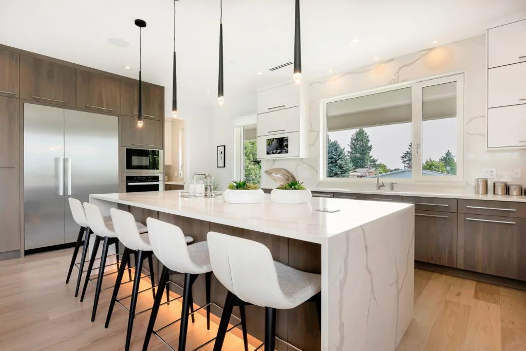 Modern quartz kitchen island with waterfall countertop installed in an East Tennessee home